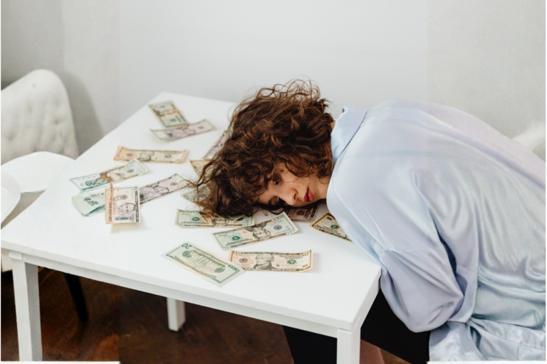 woman overwhelmed with money