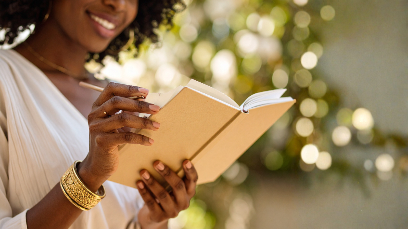 Woman smiling reading her money story