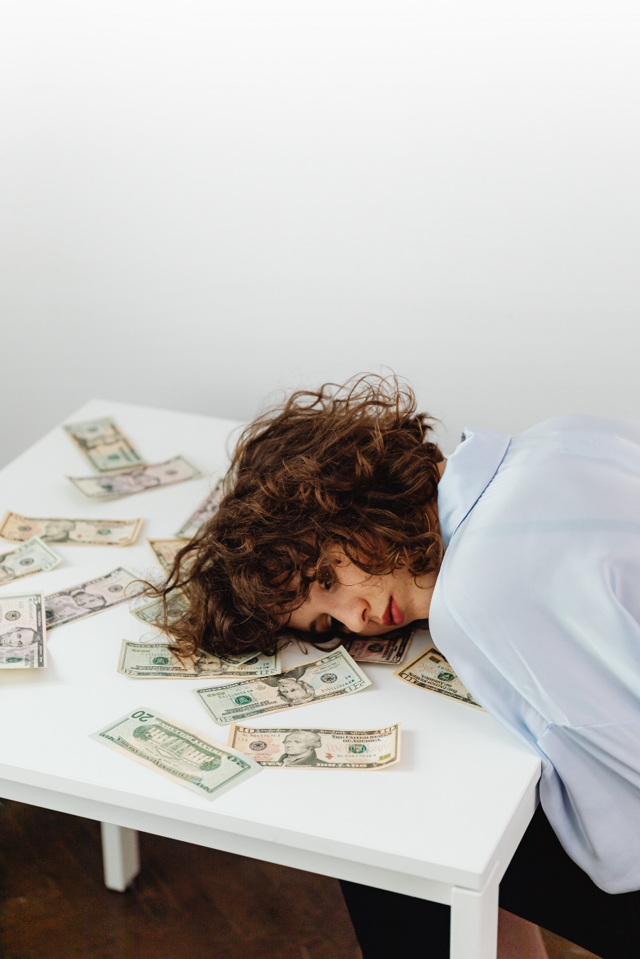 Woman overwhelmed with financial burdens and money stress